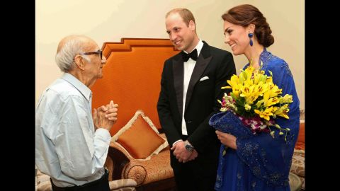 The Duke and Duchess of Cambridge speak with Boman Kohinoor during a meeting in Mumbai, India, on Sunday, April 10. Kohinoor, 93, has a strong claim to be India's biggest fan of the British royal family. Giant cardboard cutouts of William and Kate adorn his restaurant. His dream came true after the couple was made aware of a social media campaign with the hashtag #WillKatMeetMe.