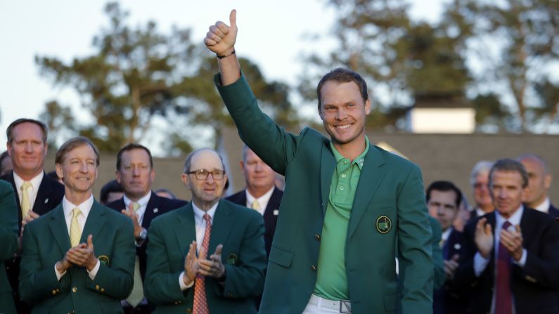 Masters champion Danny Willett gives a thumbs-up to the crowd after winning the tournament on Sunday, April 10. He is the first Englishman to win <a href="index.php?page=&url=http%3A%2F%2Fwww.cnn.com%2F2016%2F04%2F07%2Fgolf%2Fgallery%2Fmasters-golf-2016%2Findex.html" target="_blank">the Masters</a> since Nick Faldo in 1996.