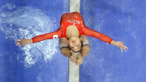 Japanese gymnast Soyoka Hanawa competes on the balance beam Saturday, April 9, during the Pacific Rim Gymnastics Championships.