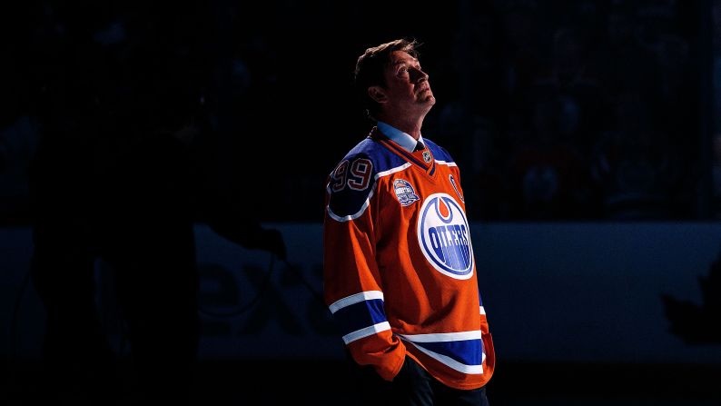 Hockey great Wayne Gretzky looks up at the Rexall Place rafters after the arena hosted its final game in Edmonton, Alberta, on Wednesday, April 6. The Edmonton Oilers are moving into a new building next season.