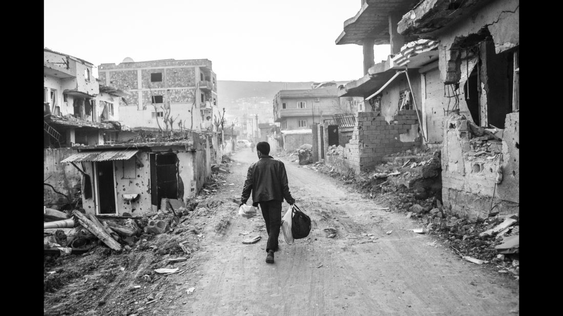 A man walks through Cizre in March.