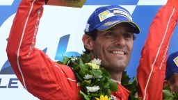 Mark Webber celebrates on the podium in the World Endurance Championship.