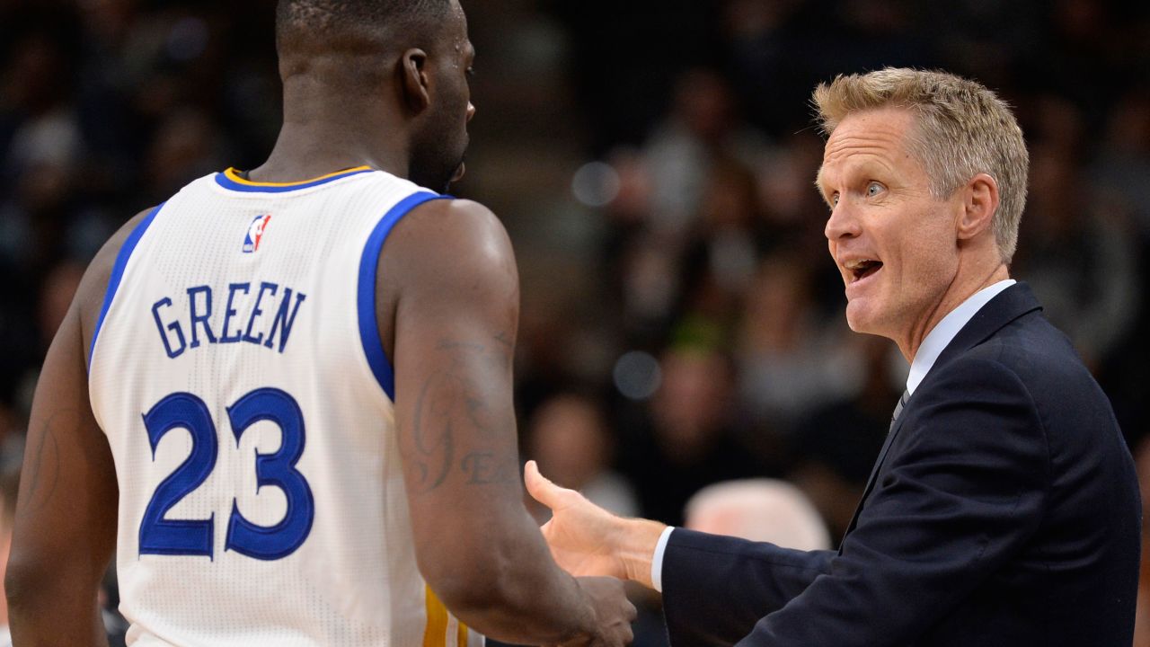 Golden State Warriors head coach Steve Kerr (right, talking to forward Draymond Green) was a member of the Chicago Bulls' 72-10 team in the 1995-96 season.