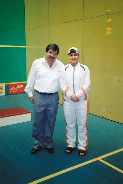 Toorpakai with legendary Pakistani squash player Qamar Zaman at the 2004 Asian Games in Malaysia. It was the team's first big tournament outside the country.