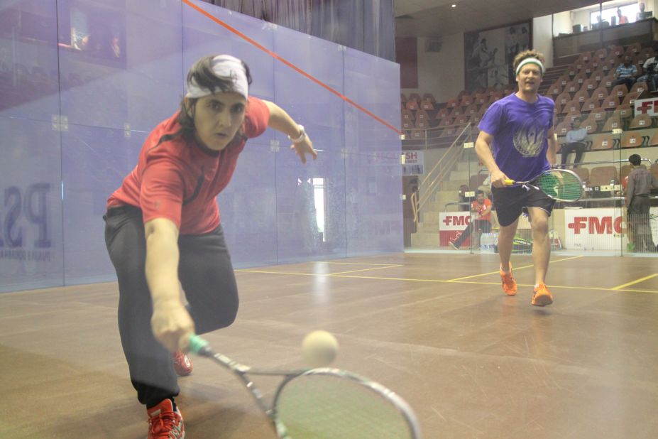 Getting a feel for the court with coach Power at the 2014 Asian Championships in Pakistan.