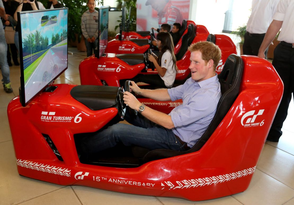 Royal racers: Prince Harry piloting an F1 driving simulator at the Ayrton Senna Institute, Sao Paulo, Brazil in 2014.