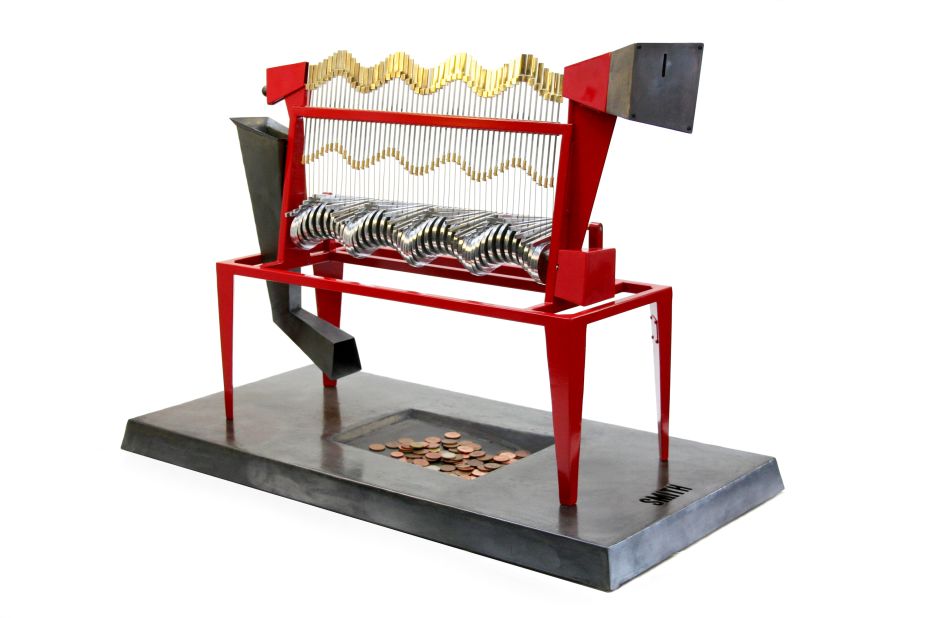 In a limited edition of just six, <a href="http://www.smithautomata.co.uk/" target="_blank" target="_blank">Martin Smith's</a> Cache Machine turns the traditional idea of a personal bank on its head. <br /><br />This incredible kinetic sculpture adds rhythm and interactivity to coin collection and, ironically, keeps the coins in open view. When a coin is inserted, it travels along a mechanically generated wave that ebbs and flows until it reaches its destination: a simple collection plate.