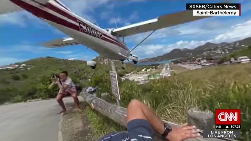 Tourist almost gets hit by a plane