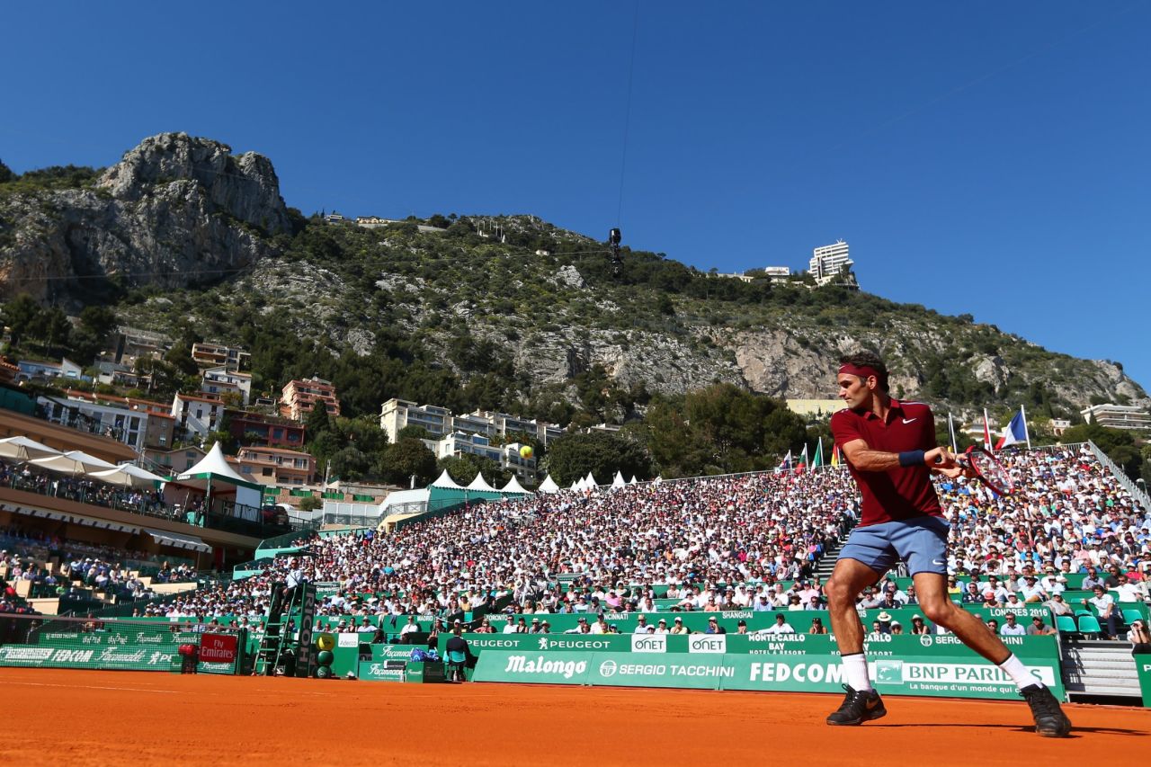 Roger Federer defeated Guillermo Garcia-Lopez 6-3 6-4 at the Monte Carlo Masters Tuesday -- his first match since being sidelined with a knee injury after the Australian Open in January