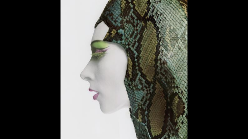 A model poses in a snakeskin hood in 1965.
