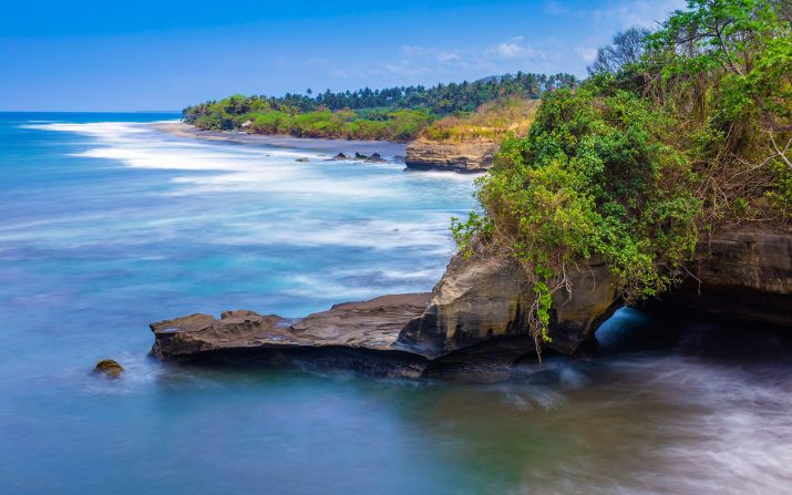 <strong>Balian Beach:</strong> Balian's black sand fills the dunes and provides an escape from Bali's bustling areas. It's a great place to grab a beer and enjoy the sunset.