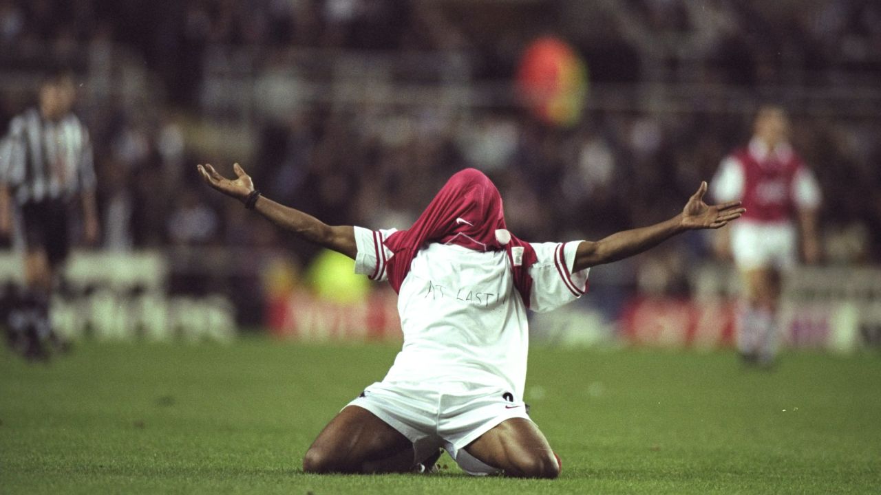 Ian Wright celebrates one of his 185 Arsenal goals.