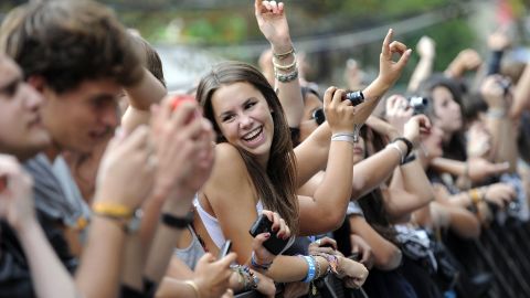 People listen to BB Brunes performing on stage during the Rock-en-Seine music festival on August 27, 2011, in Saint-Cloud, near Paris, France.  AFP PHOTO / JOHANNA LEGUERRE (Photo credit should read JOHANNA LEGUERRE/AFP/Getty Images)