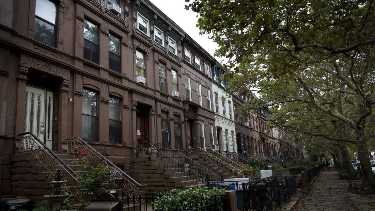 Brownstone buildings line a street of the Bedford-Stuyvesant neighborhood in Brooklyn. The area's homes have grown in value as the borough has become more attractive to buyers and renters.  