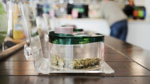 CannaCo customers can smell and magnify strains of marijuana.