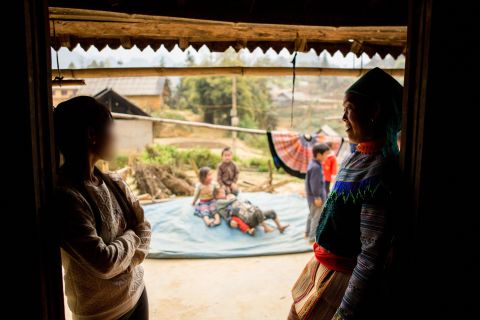  A young woman, left, visits her mother in Northern Vietnam. She was tricked by traffickers into crossing the border to China, but managed to escape before they could force her into a marriage. She is now back in her home country sharing her story to warn vulnerable girls about trafficking.