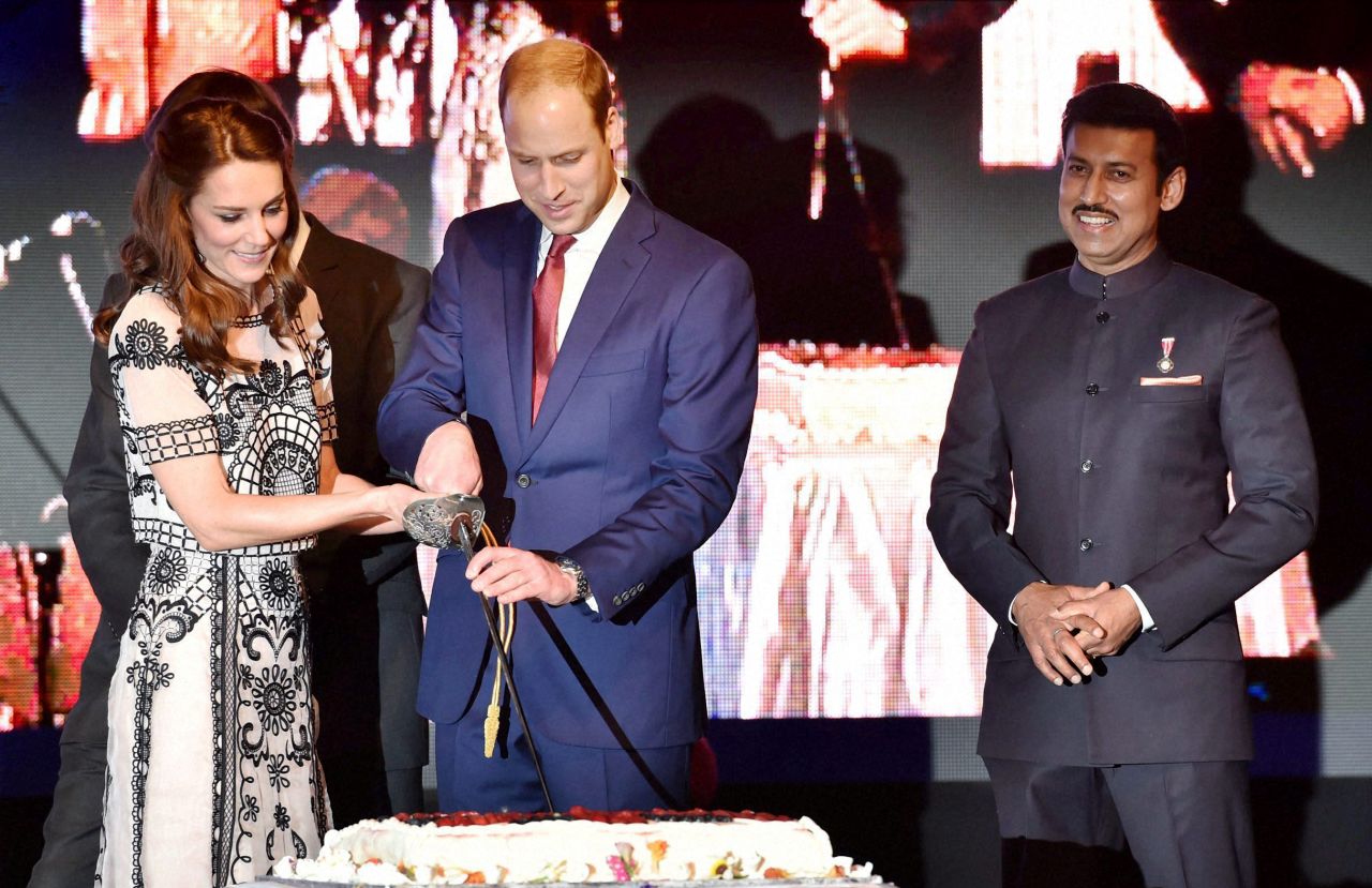 William and Catherine cut a cake during 90th birthday celebrations for Queen Elizabeth II at the residence of the British High Commissioner in New Delhi on Monday, April 11.
