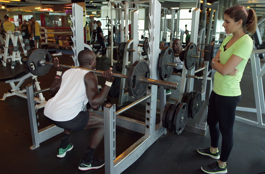 Injera bends with his back straight before leaping upwards.