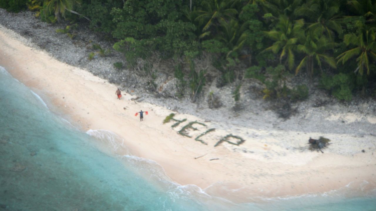 A man waves life jackets next to a "help" sign made up of palm fronds in this photo released by the U.S. Navy on Sunday, April 10. The Navy and Coast Guard <a href="http://www.cnn.com/2016/04/08/politics/castaways-rescue-help-sign/" target="_blank">rescued three castaways</a> who had been stranded on Fanadik Island for three days. The remote Pacific island, part of the Federated States of Micronesia, is about 2,600 miles southwest of Honolulu.