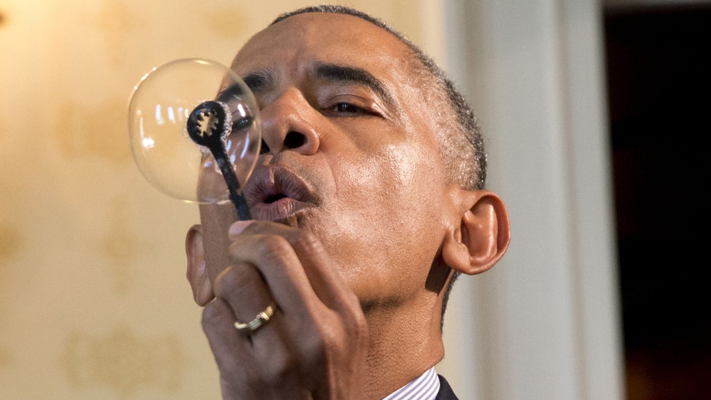 U.S. President Barack Obama uses a 3-D-printed bubble wand, designed by 9-year-old Jacob Leggette, as he tours the <a href="http://www.cnn.com/2016/04/14/politics/2016-white-house-science-fair/" target="_blank">White House Science Fair</a> on Wednesday, April 13.