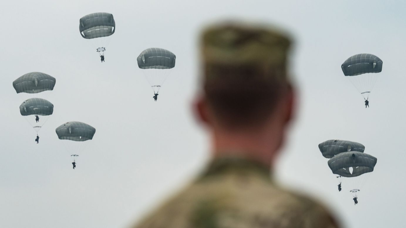 Parachutists land near Burglengenfeld, Germany, during a training exercise carried out by American, British and Italian soldiers on Tuesday, April 12.