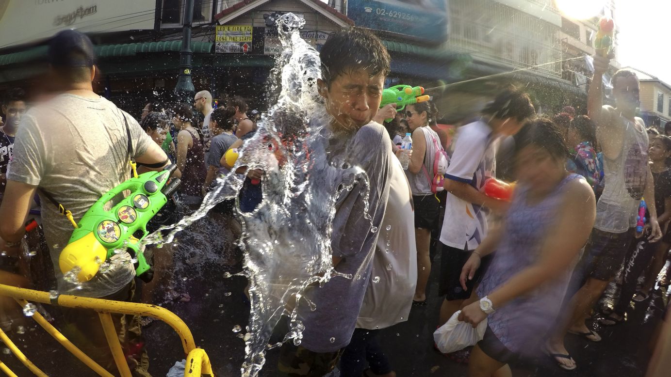 Revelers douse each other with water during the Songkran festival in Bangkok, Thailand, on Wednesday, April 13.