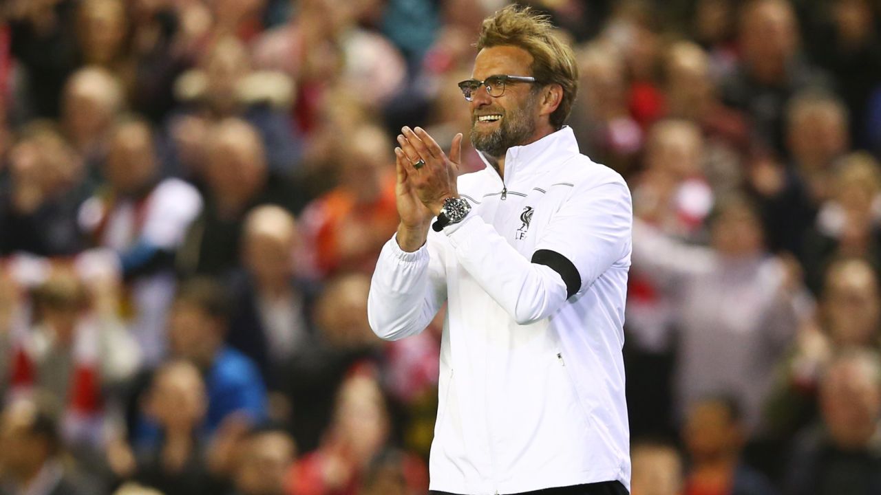 Klopp celebrates victory after Liverpool's implausibe Europa League quarterfinal win.