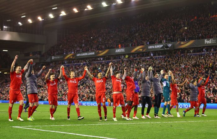 Liverpool players celebrate victory after the remarkable Europa League quarterfinal second leg match against Borussia Dortmund at Anfield. The Reds triumphed 4-3 on the night having trailed by two goals, and will now play Villarreal in the semifinal.  