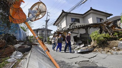 A house in Mashiki teeters after the quake.