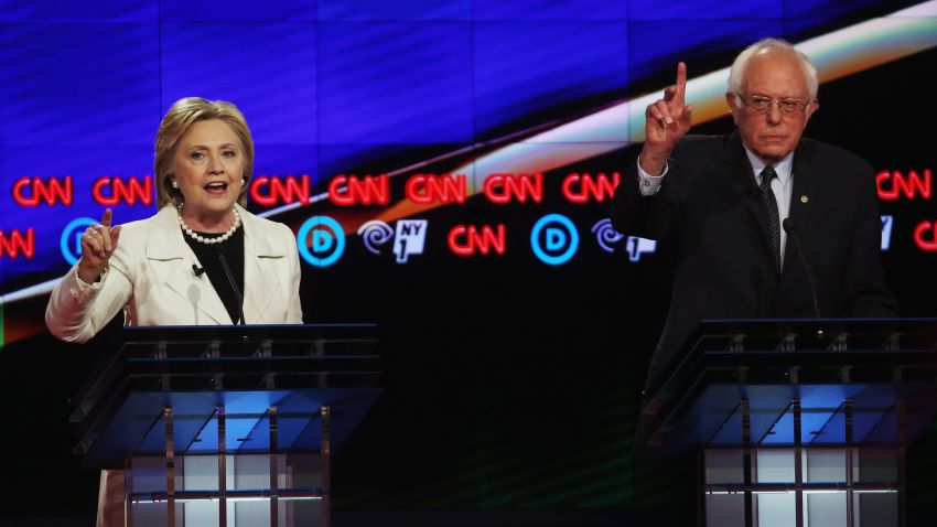 NEW YORK, NY - APRIL 14:  Democratic Presidential candidates Hillary Clinton and Sen. Bernie Sanders (D-VT) debate during the CNN Democratic Presidential Primary Debate at the Duggal Greenhouse in the Brooklyn Navy Yard on April 14, 2016 in New York City. The candidates are debating ahead of the New York primary to be held April 19.  (Photo by Justin Sullivan/Getty Images)
