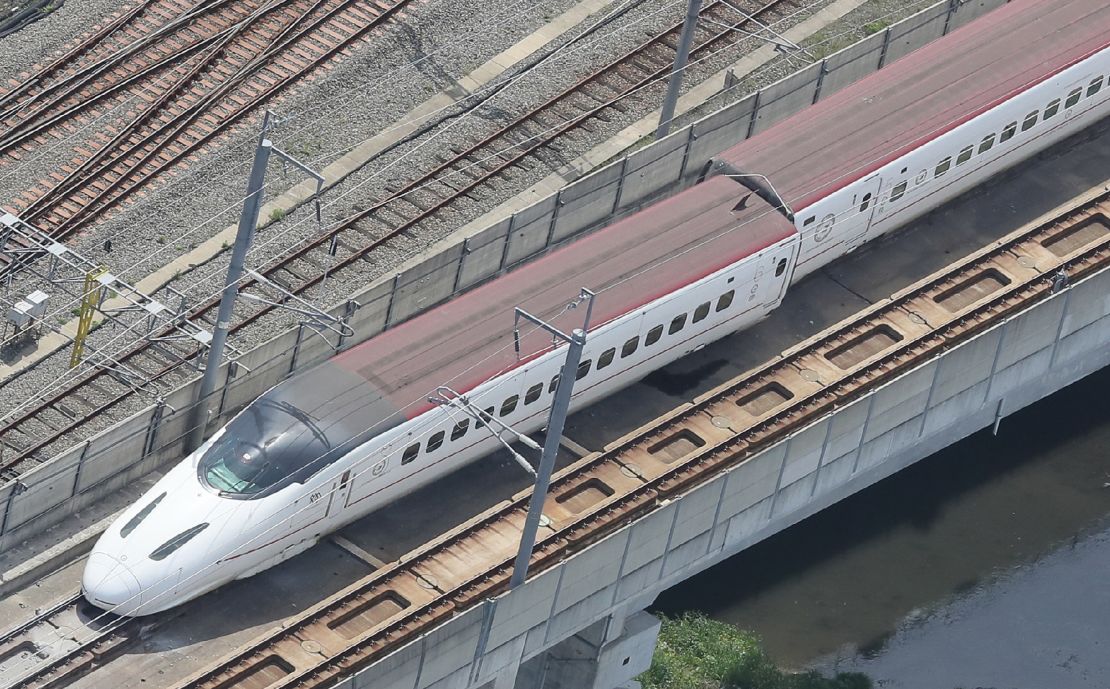 A derailed Kyushu shinkansen, or bullet train, in the city of Kumamoto.
