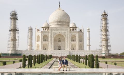 Prince William and Catherine, the Duke and Duchess of Cambridge, sit in front of the Taj Mahal on Saturday, April 16, in Agra, India. Princess Diana was photographed in the same spot in a famous photo from 1992. This is the last engagement of the Royal couple after a weeklong visit to India and Bhutan that has taken them to Mumbai, Delhi, Kaziranga, Thimphu and Agra. 