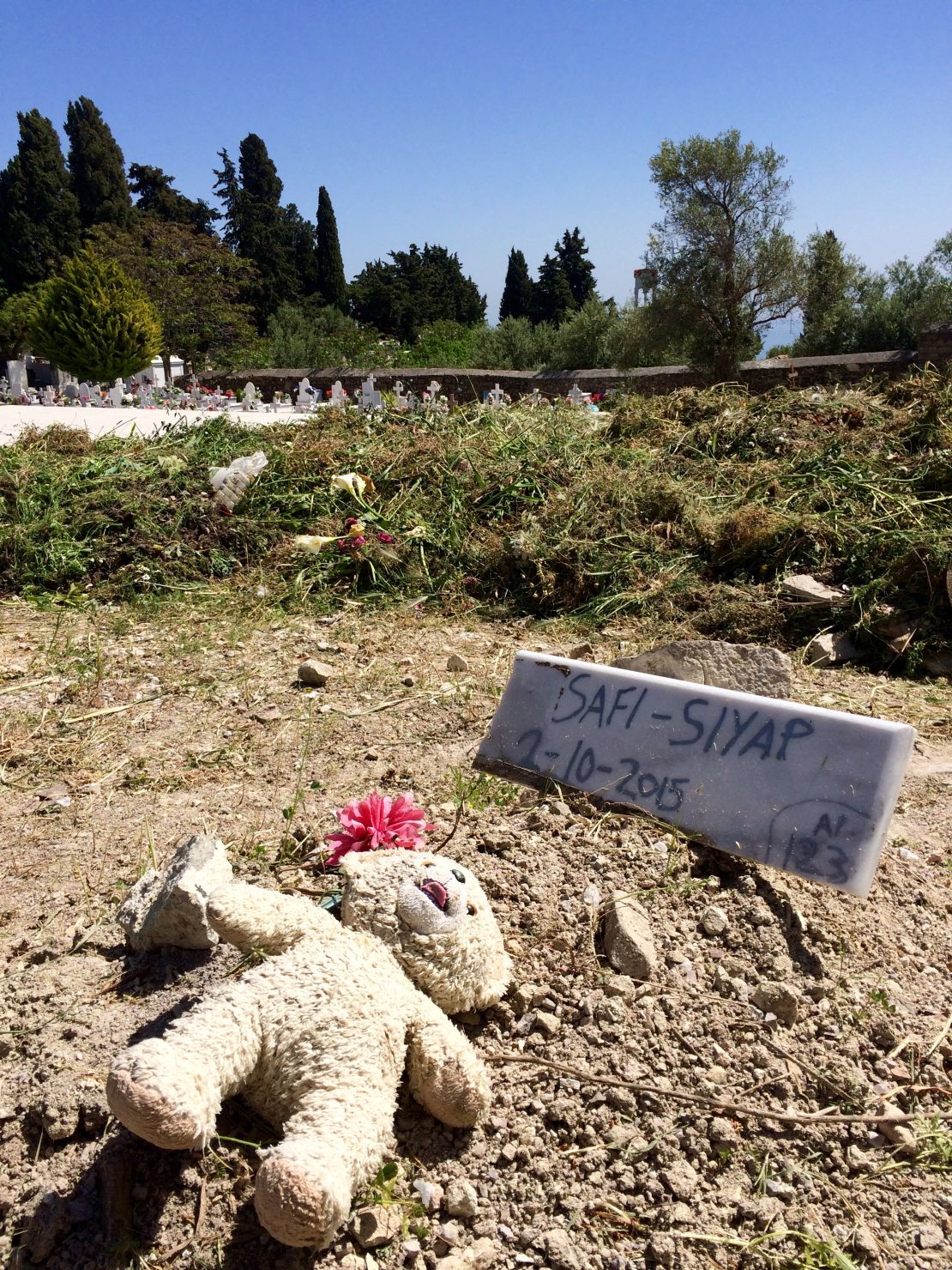 The grave of 1-year-old Safi Siyap, who drowned while the coast guard attempted to rescue her family.