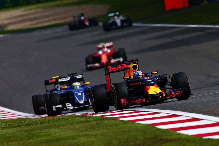 Daniel Ricciardo of Australia driving the (3) Red Bull Racing Red Bull-TAG Heuer RB12 TAG Heuer leads Marcus Ericsson of Sweden driving the (9) Sauber F1 Team Sauber C35 Ferrari 059/5 turbo on track during the Formula One Grand Prix of China.