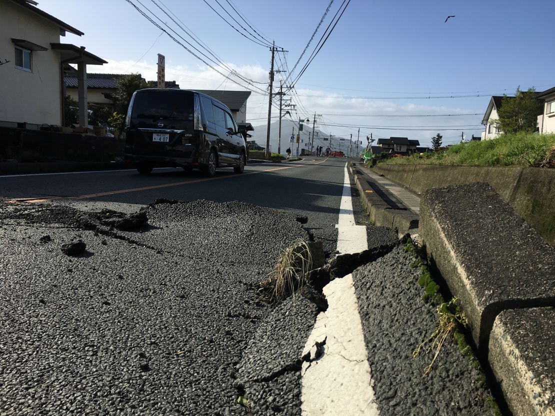 A road cracked from the immense quake. 