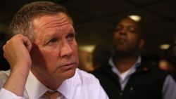 John Kasich talks with reporters after having lunch at PJ Bernstein's Deli Restaurant on April 16, 2016 in New York City. 