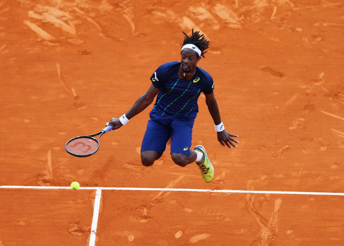 Gael Monfils with a typically acrobatic effort during his final against Nadal in Montel Carlo.
