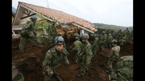Japanese troops search for victims in Minamiaso on Monday, April 18. 
