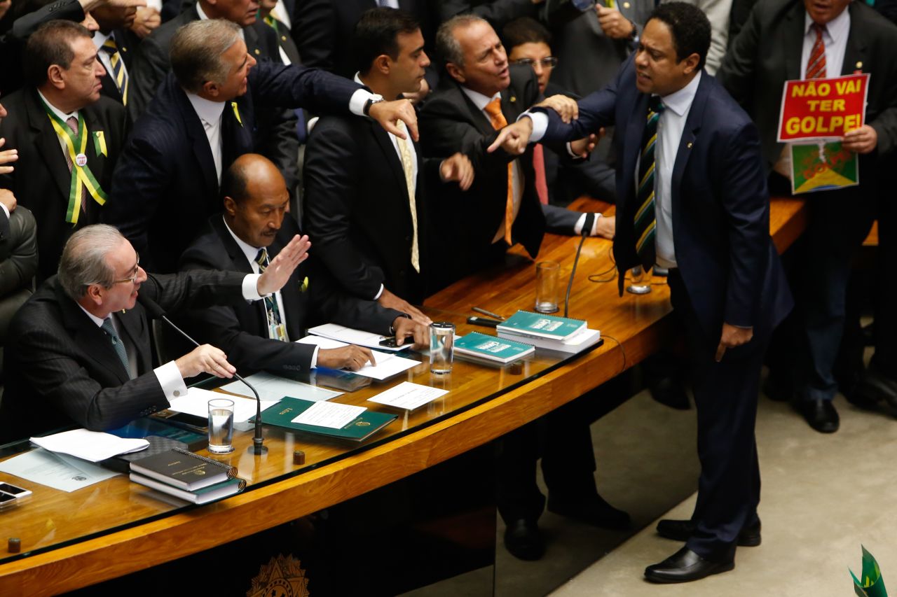 Deputies of the Lower House of Congress exchange words during the vote. After the success of the motion to impeach, it will be considered by the parliament's upper house. 
