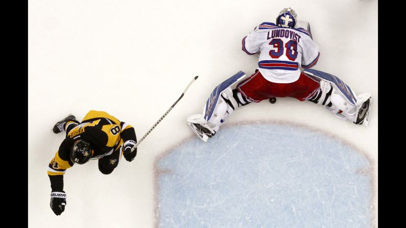 No. 81 Phil Kessel of the Pittsburgh Penguins scores past No. 30 Henrik Lundqvist of the New York Rangers in the second period in Game Two of the 2016 NHL Stanley Cup Playoffs at Consol Energy Center in Pittsburgh on April 16. 