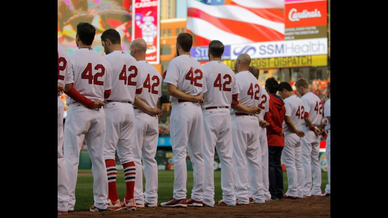 St. Louis Cardinals players stand for the national anthem before their game against the Cincinnati Reds at Busch Stadium in St. Louis, Missouri, on April 15. All players wore No. 42 jerseys in honor of Jackie Robinson Day. <a href="index.php?page=&url=http%3A%2F%2Fwww.cnn.com%2F2016%2F04%2F12%2Fsport%2Fgallery%2Fwhat-a-shot-sports-0412%2Findex.html" target="_blank">See 29 amazing sports photos from last week</a>