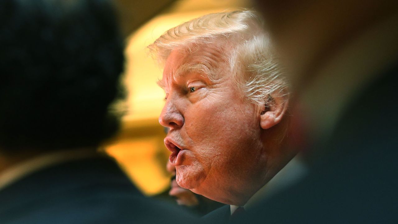 Donald Trump greets members of the "National Diversity Coalition for Trump," a day ahead of New York primary on April 18, 2016 in New York City.