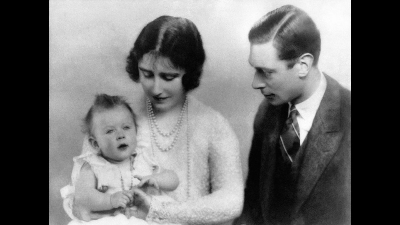 The Duke and Duchess of York with Princess Elizabeth in December 1926. 