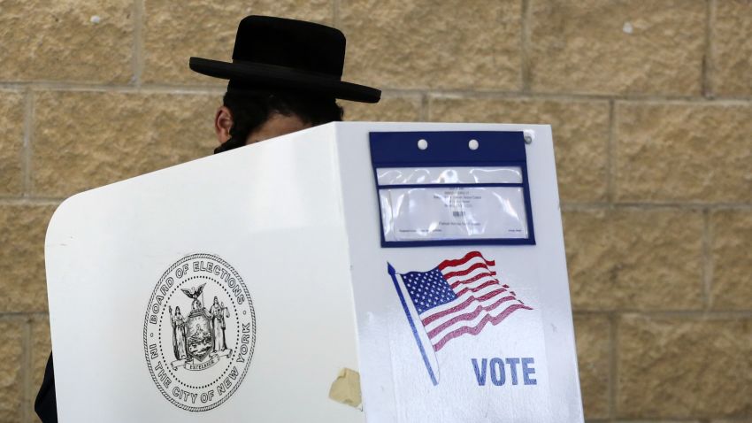 A man casts his vote at a polling station in Brooklyn, in the presidential primary for the state of New York April 19, 2016.