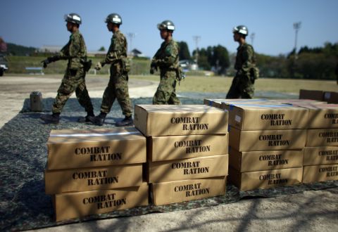 Japan Self-Defense Forces prepare relief supplies delivered by a U.S Marine Corp Osprey on April 19 in Minamiaso.