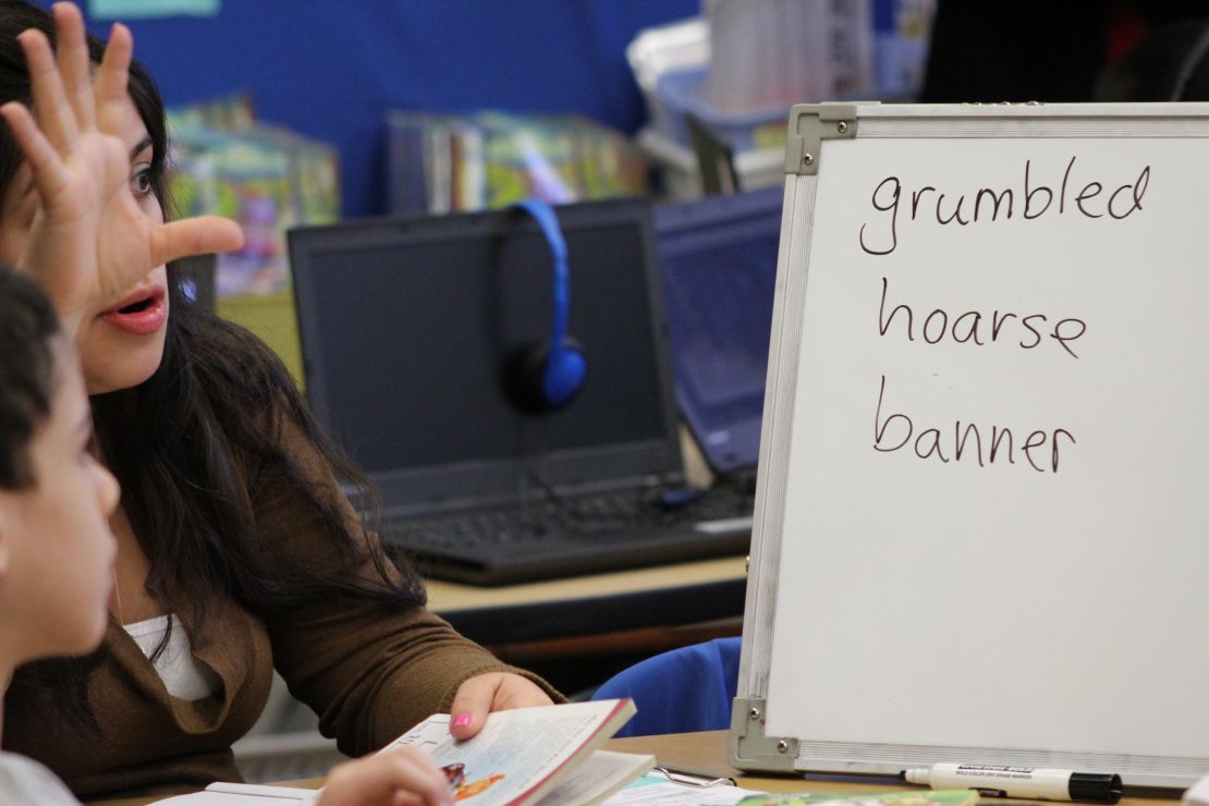 Ashley Aucar helps her third-graders at P.S. 94 expand their vocabulary.