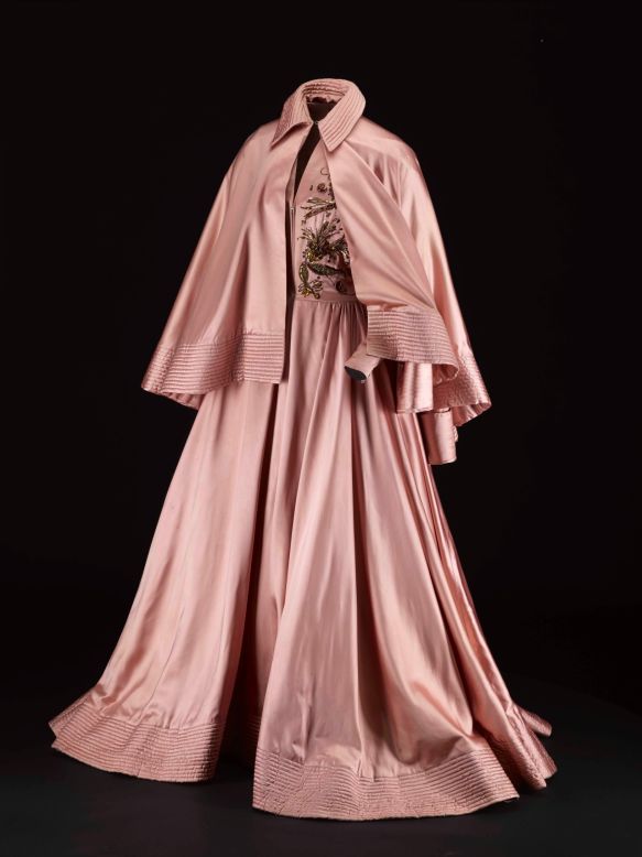 Jacques Fath is one of the designers credited with contributing to the rebirth of haute couture during its Golden Age following the Second World War. It's particularly significant for the fact that it dates from around 1948, after Dior's New Look of 1947 had changed the course of fashion but while clothing restrictions were still in force in Britain due to rationing. <br /><br />The gown represents the height of luxury for this period, and its glamorous associations are the focus of our section on film fashion, since Ava Gardner, Greta Garbo and Rita Hayworth were avid fans of Fath's work. 