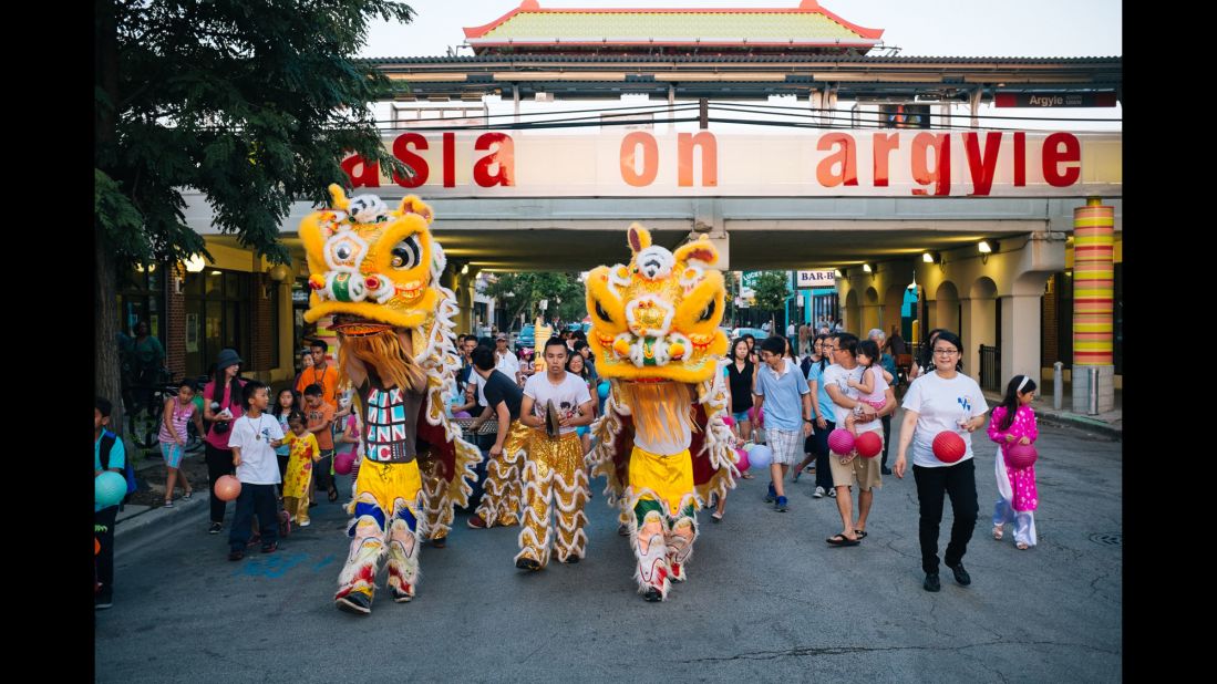 Chinese lions march through a night market in Little Saigon's Uptown neighborhood, which is known as having the best Vietnamese food in the city.