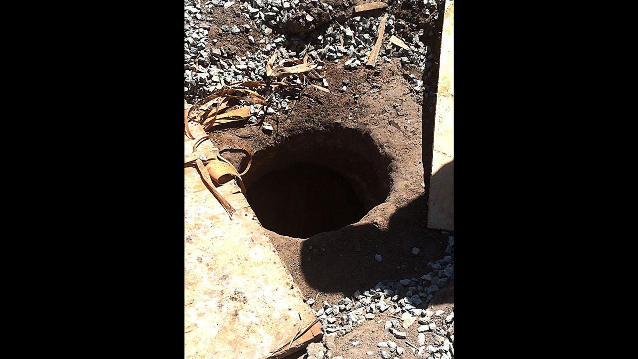 The tunnel exit on the U.S. side is a 3-foot-diameter hole that was covered by an industrial dumpster.