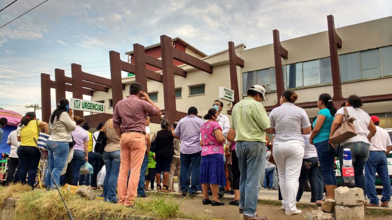 Relatives wait outside a hospital after the explosion.